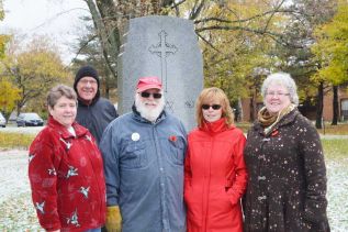 Linda Bates, John McDougall, Doug Lovegrove, Leann Benoit and Deb Lovegrove at the Cenotaph at McMullen Park   